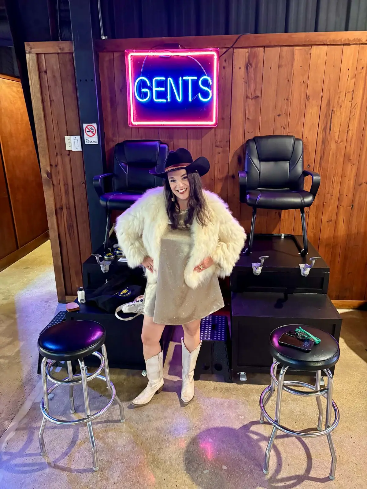 Guest posing at a Gents shoe-shine pop-up